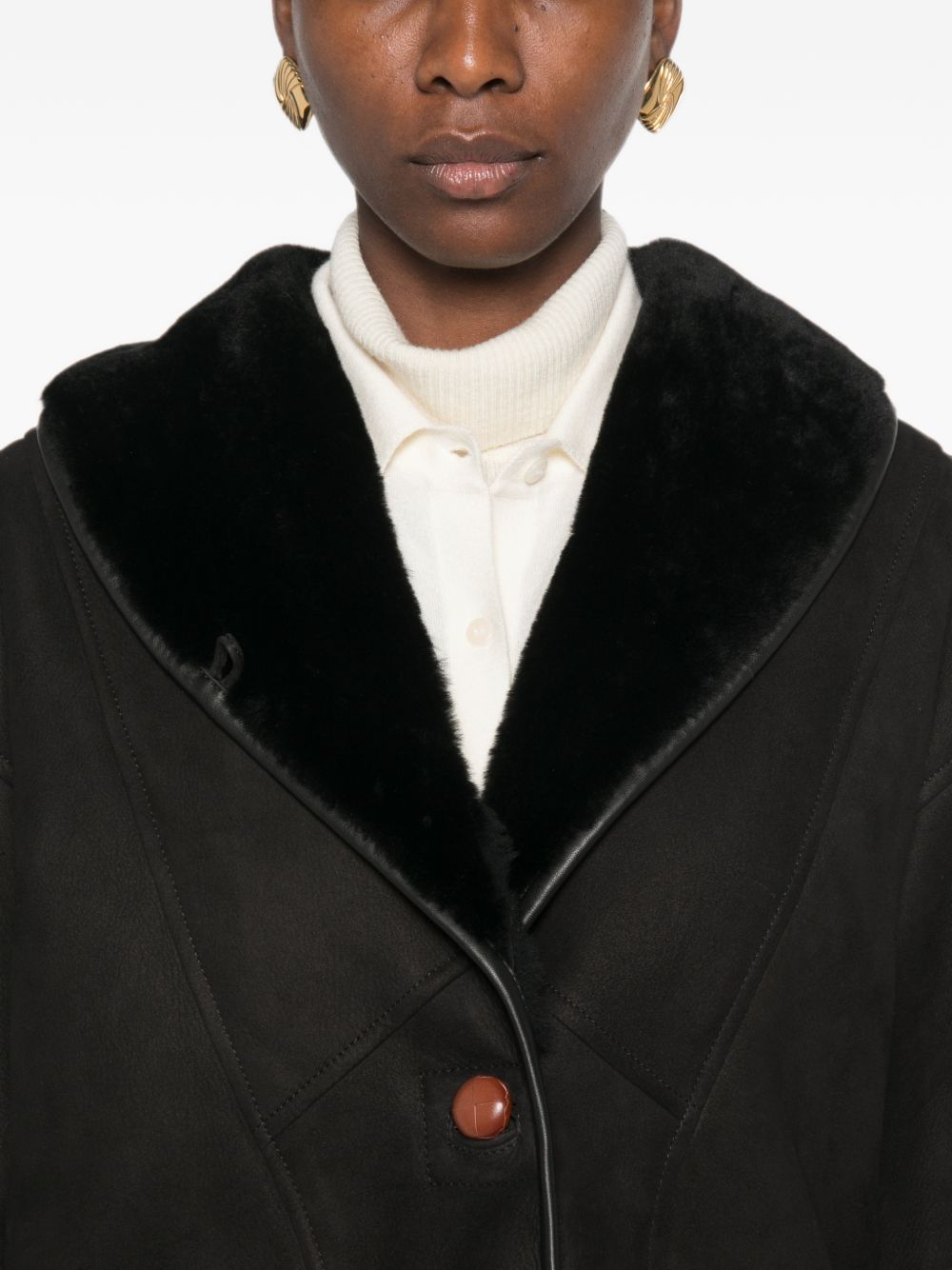 Giacca in shearling con le tasche in nero 