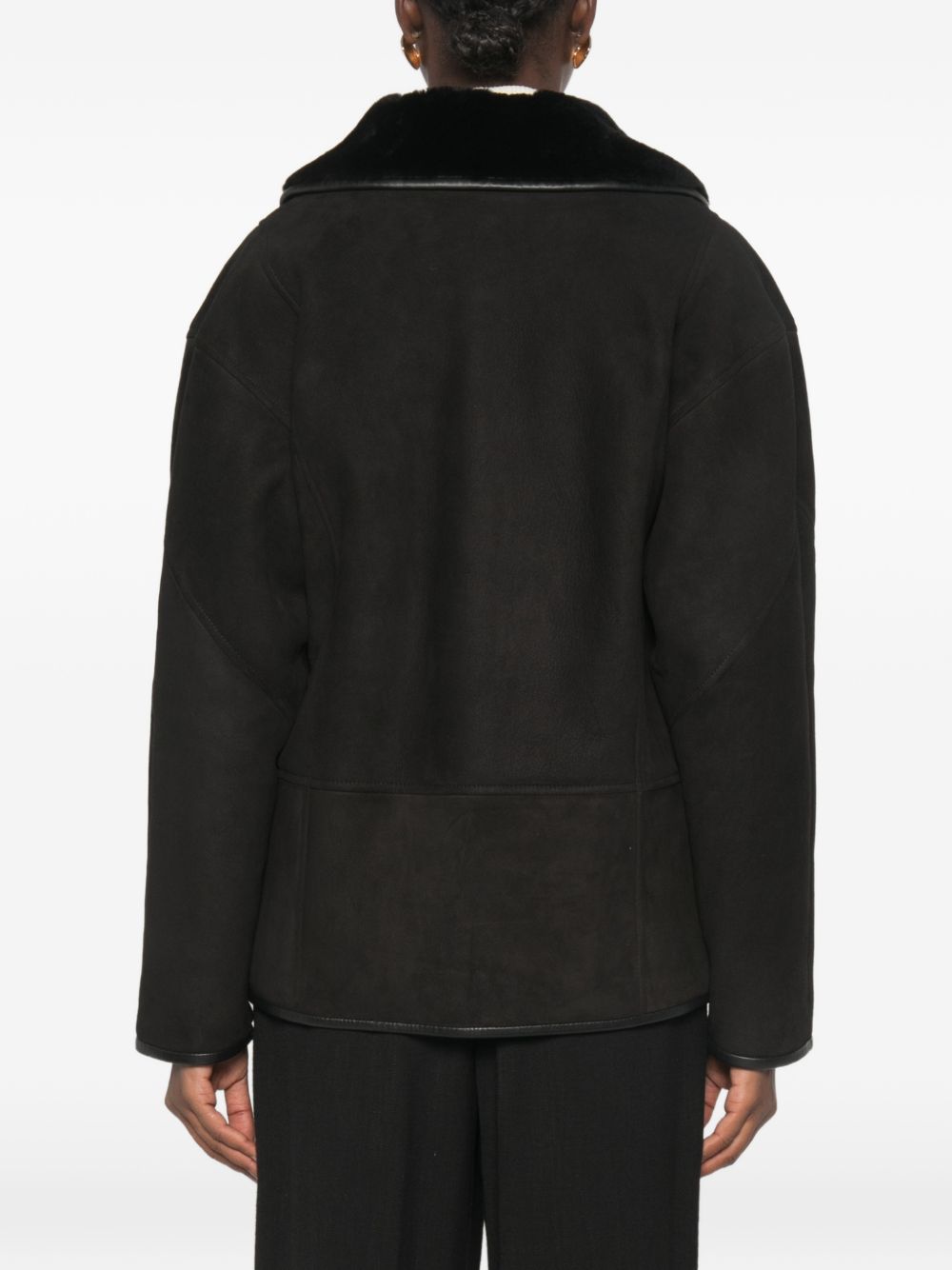 Giacca in shearling con le tasche in nero 