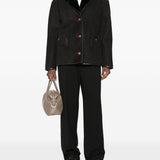 Giacca in shearling con le tasche in nero 