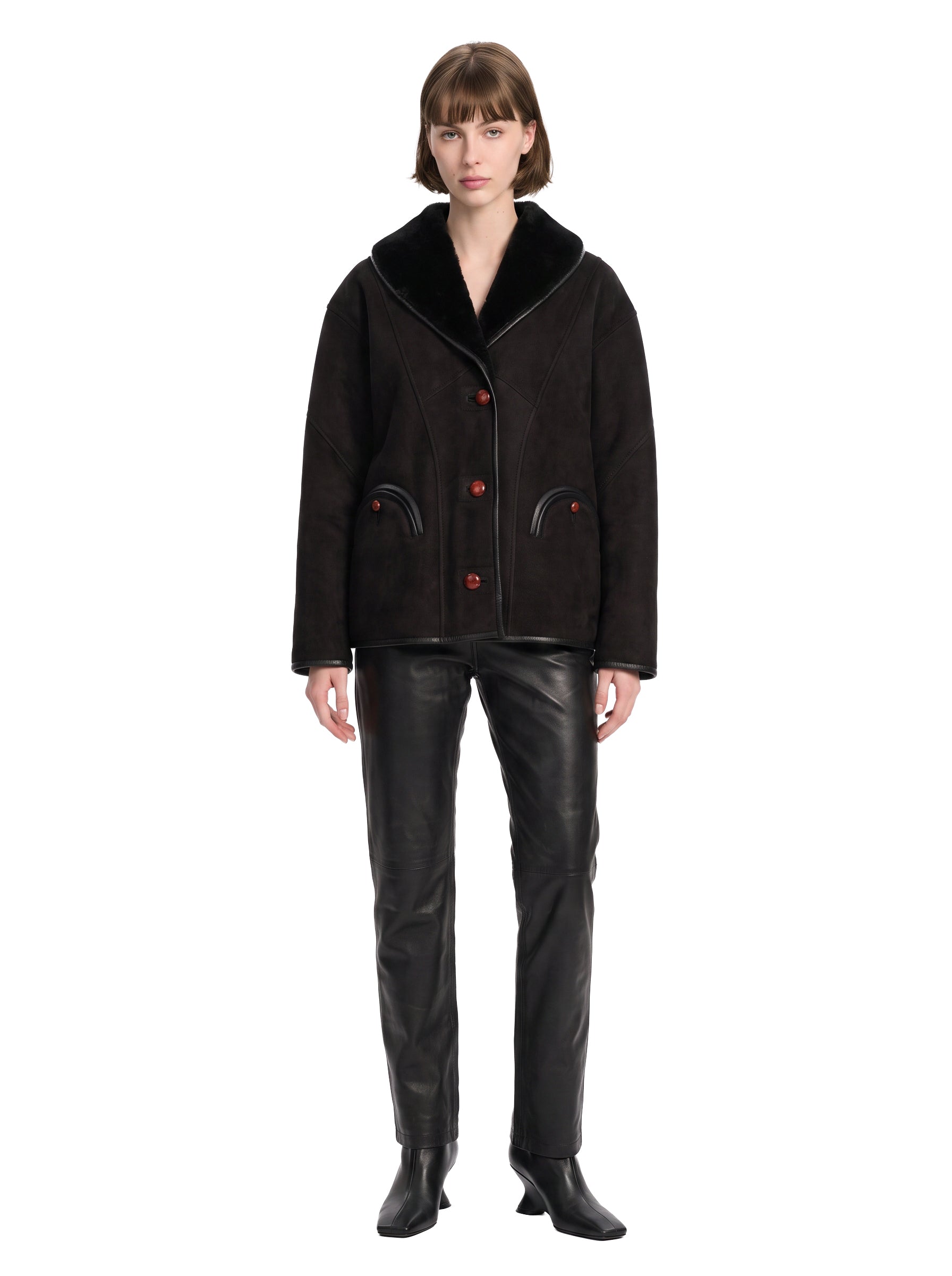 Giacca in shearling con le tasche in nero 