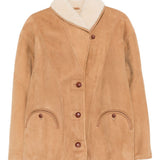 Giacca in shearling con le tasche in beige 