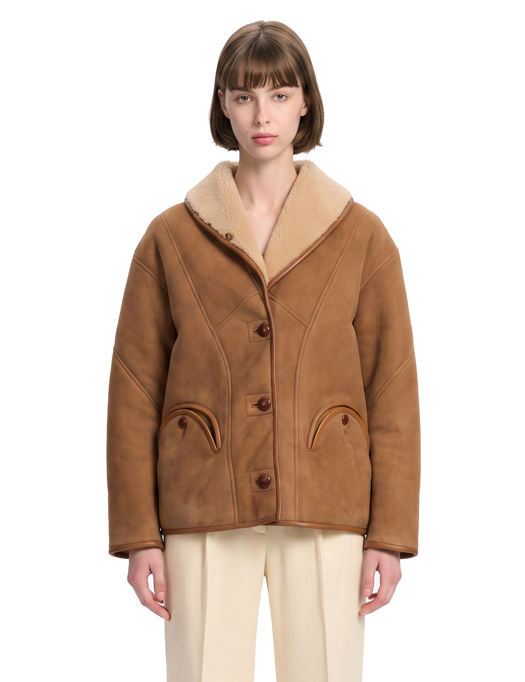 Giacca in shearling con le tasche in marrone 