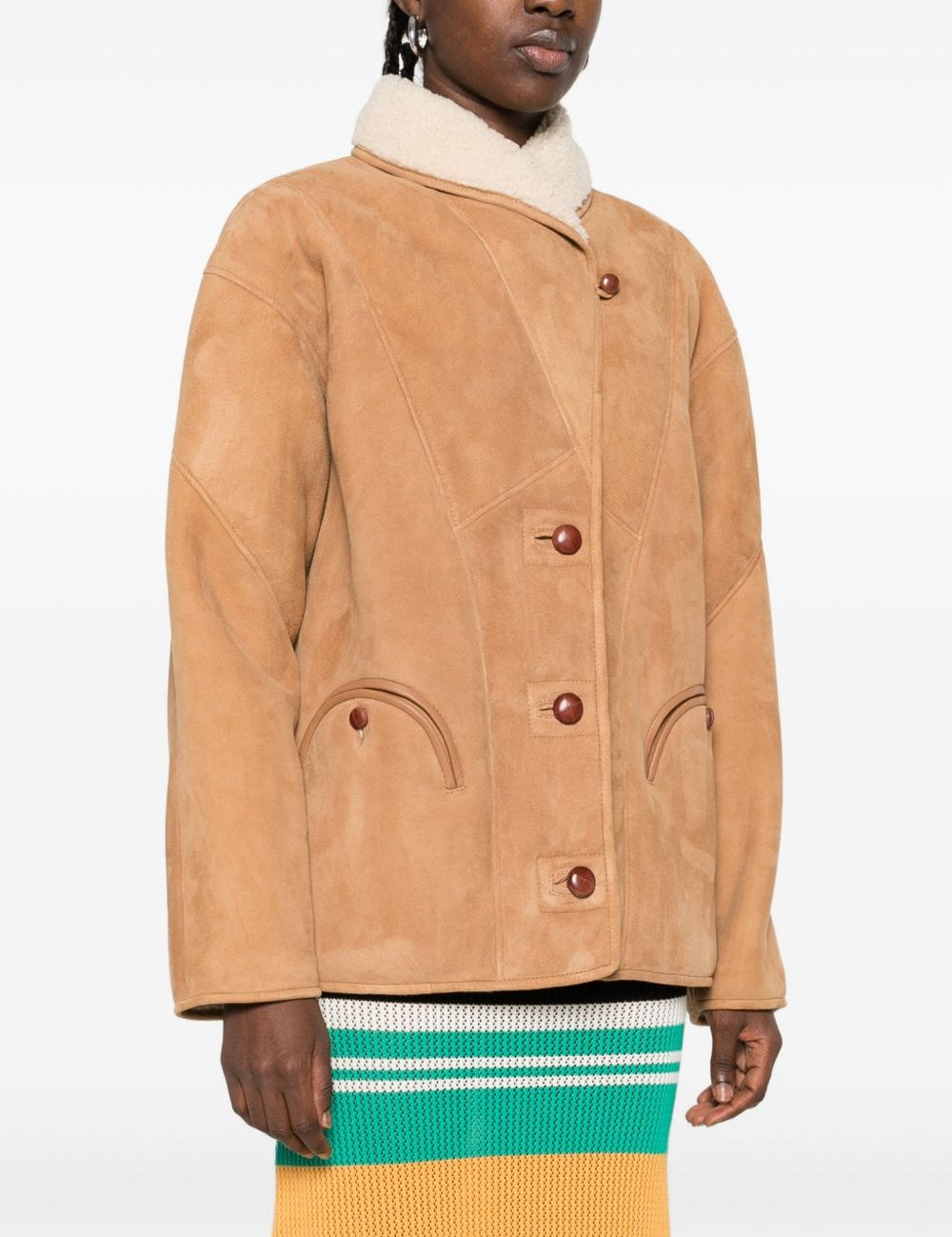 Giacca in shearling con le tasche in beige 