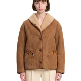 Giacca in shearling con le tasche in marrone 