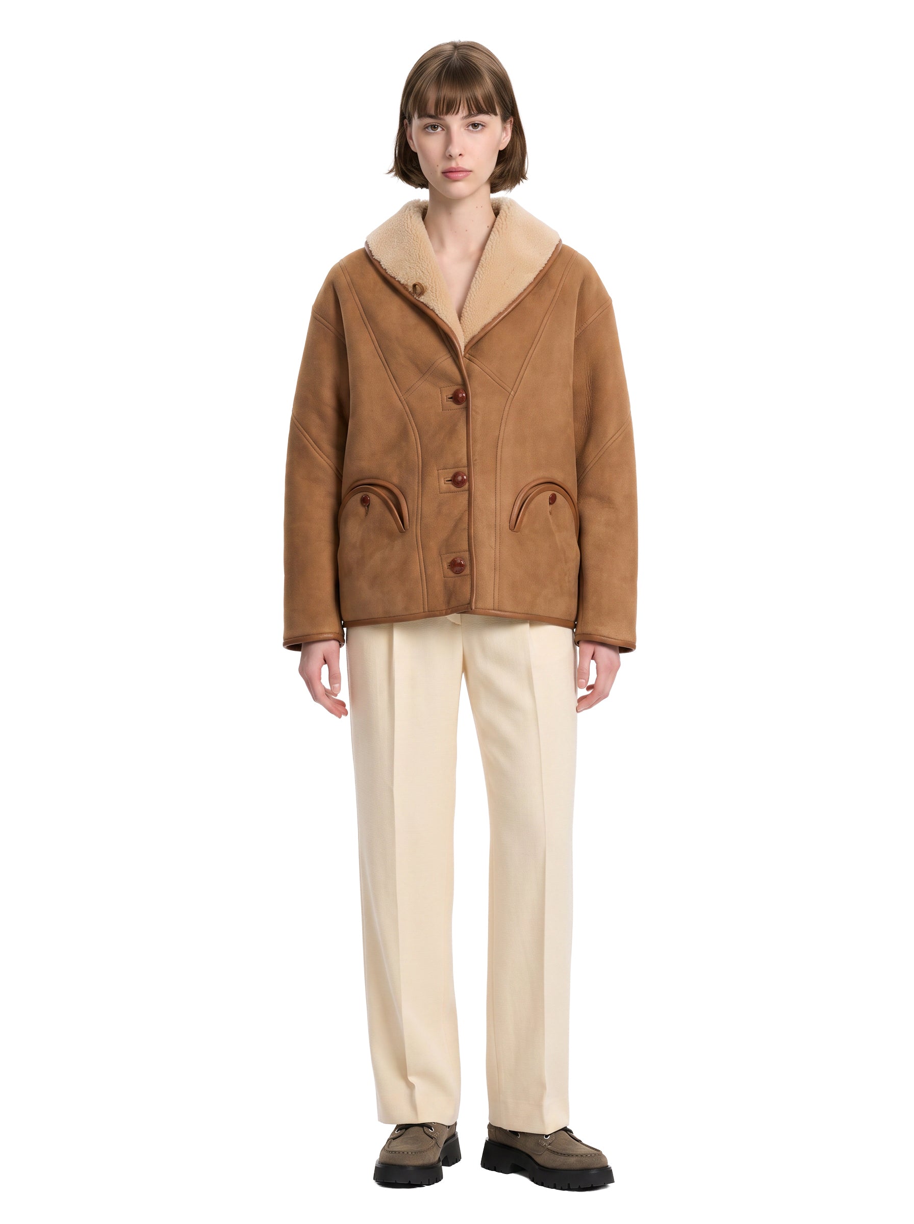 Giacca in shearling con le tasche in marrone 