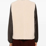 Gilet in shearling con profili in pelle in beige 
