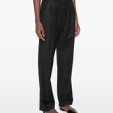 Pantaloni gessati con pieghe in nero 