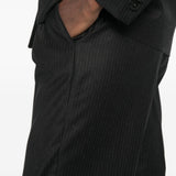 Pantaloni gessati con pieghe in nero 