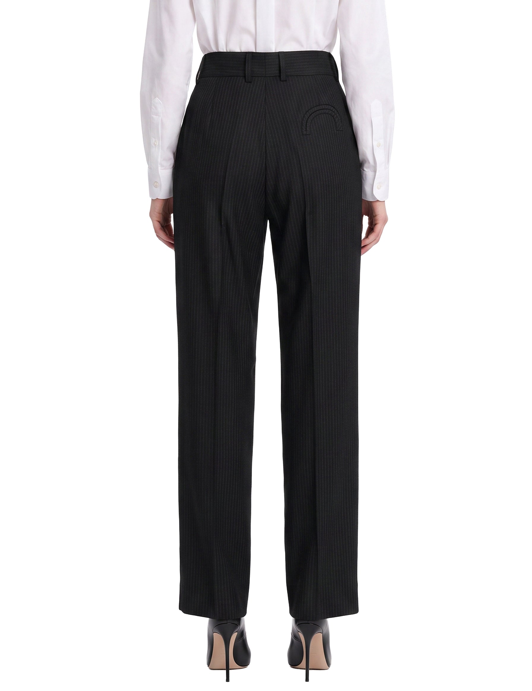 Pantaloni gessati con pieghe in nero 
