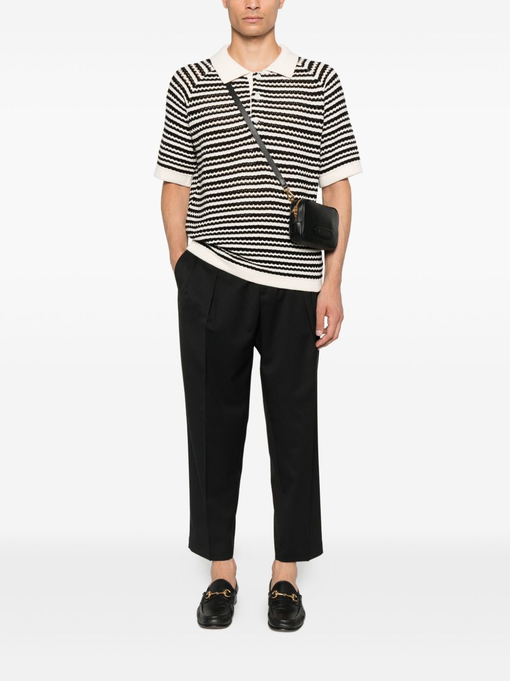 Pantaloni con pieghe frontali in nero 