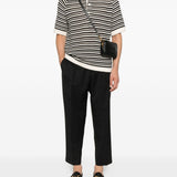 Pantaloni con pieghe frontali in nero 