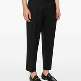 Pantaloni con pieghe frontali in nero 