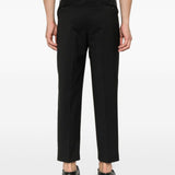 Pantaloni con pieghe frontali in nero 