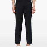Pantaloni con pieghe frontali in blu 