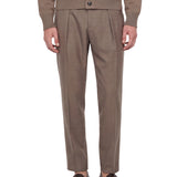Pantaloni con pieghe frontali in grigio 