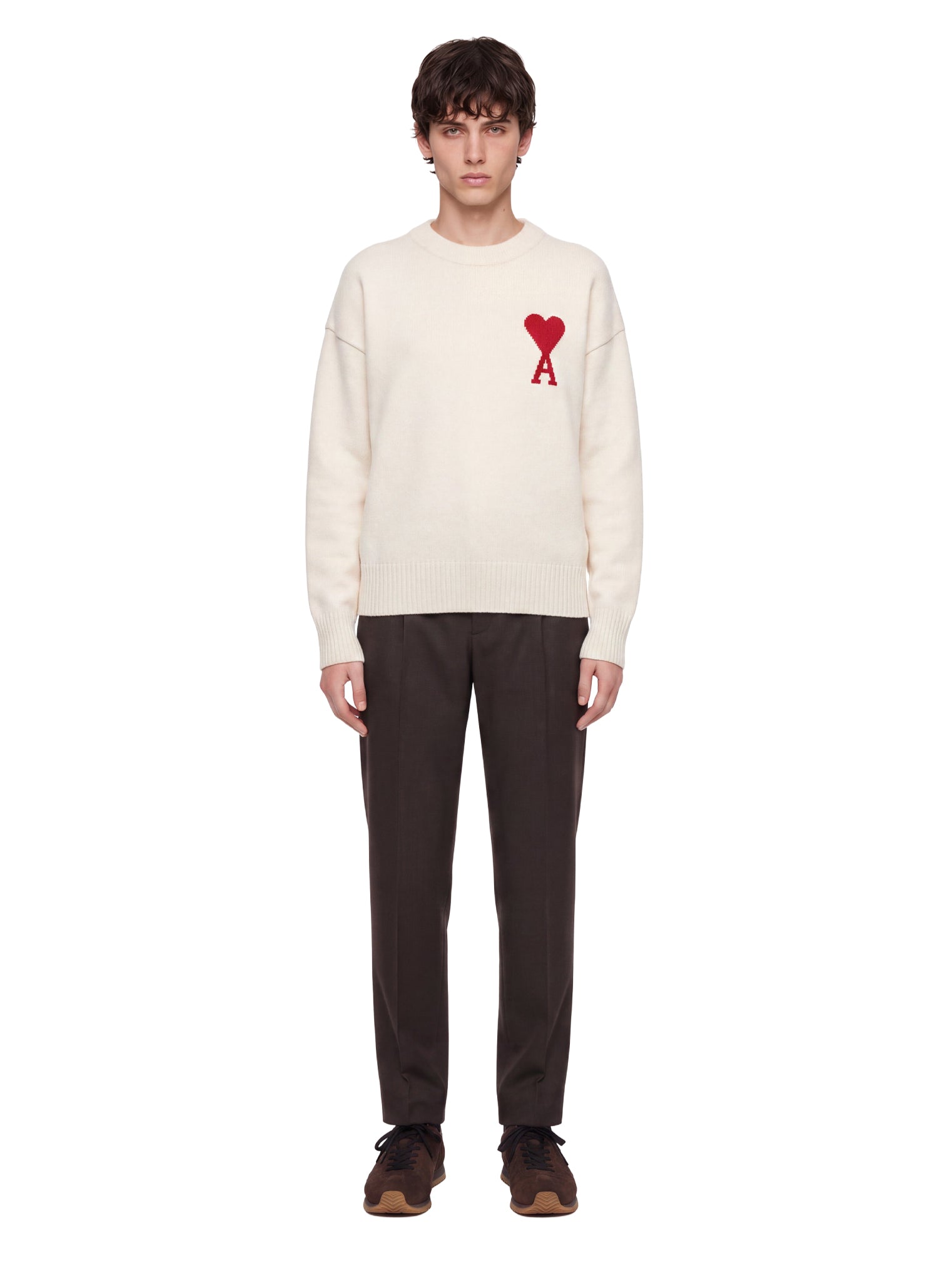 Pantaloni con pieghe frontali in marrone 