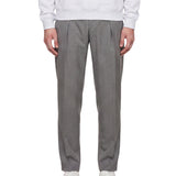 Pantaloni con pieghe frontali in grigio 