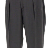 Pantaloni con pieghe frontali in grigio scuro 