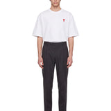 Pantaloni con pieghe frontali in grigio scuro 
