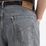 Jeans a cinque tasche in denim grigio con vestibilità iconica. In grigio Brunello cucinelli - uomo 