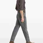 Jeans a cinque tasche in denim grigio con vestibilità iconica. In grigio Brunello cucinelli - uomo 
