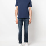 Jeans a gamba stretta in blu 
