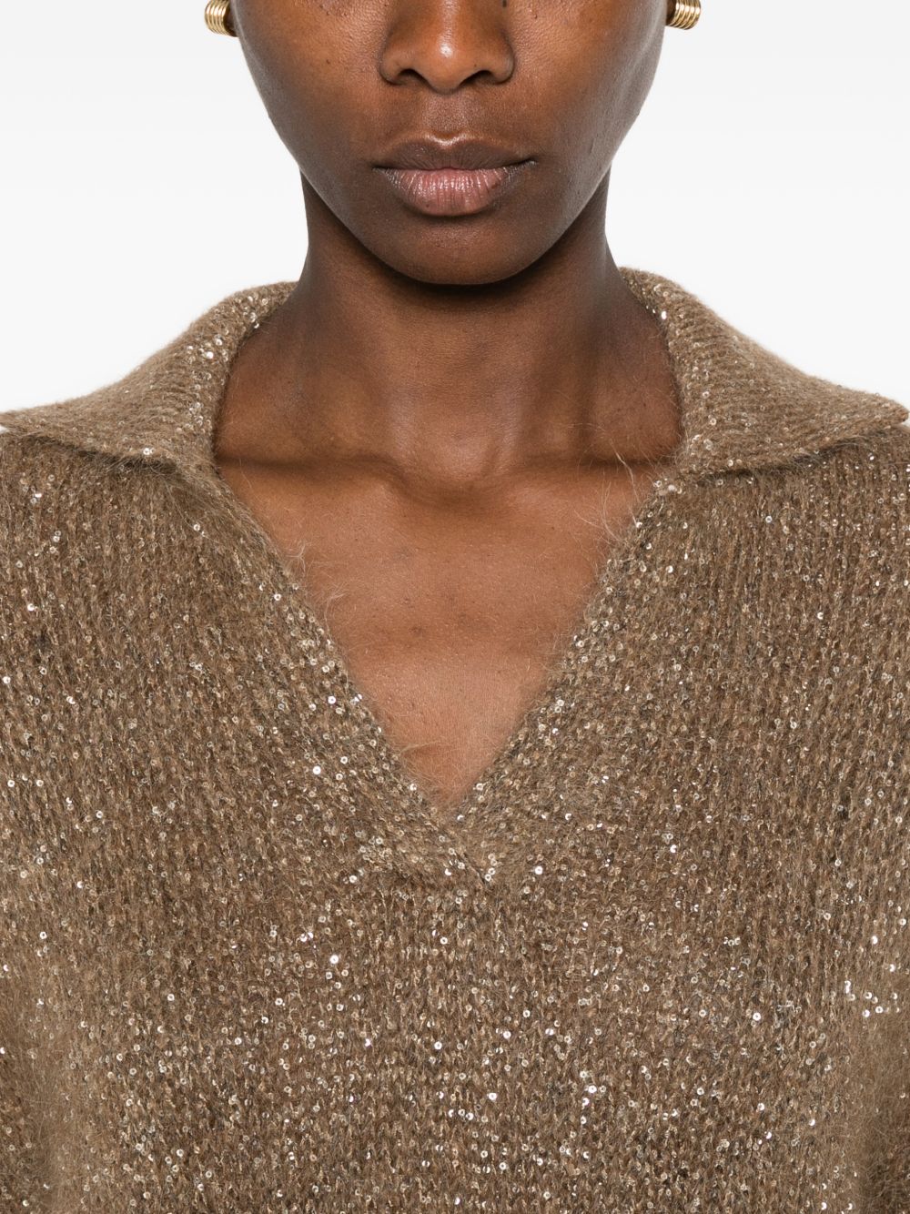 Maglione con paillettes in beige 