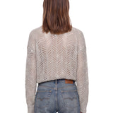 Maglione con paillettes in grigio 
