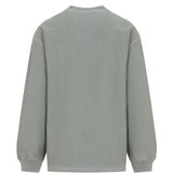 T-shirt con tasca e logo in verde Carhartt wip - uomo 