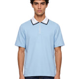 Polo con mezza zip in azzurro 