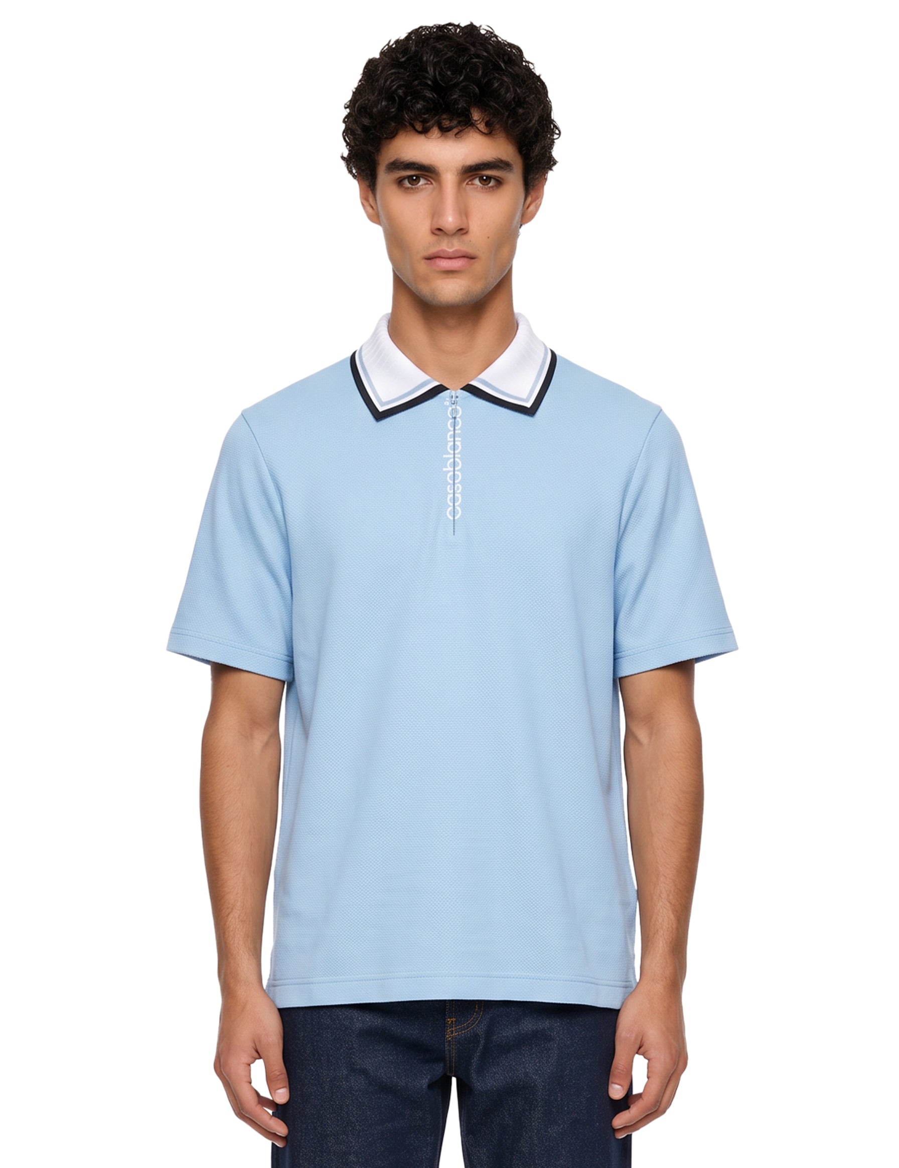 Polo con mezza zip in azzurro 