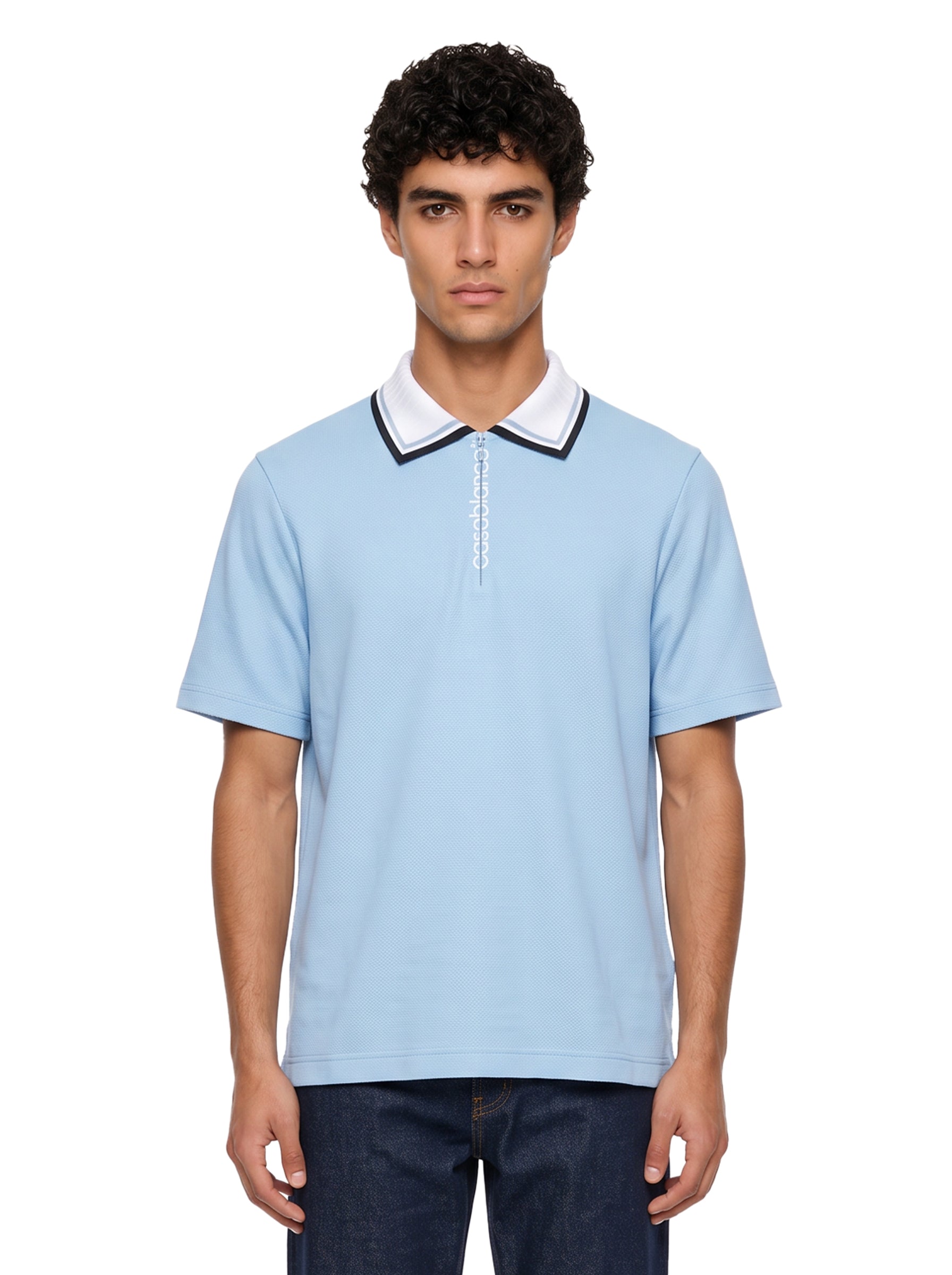 Polo con mezza zip in azzurro 
