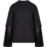 T-shirt con maniche doppie in nero 