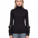 Top con maniche arricciate in nero 