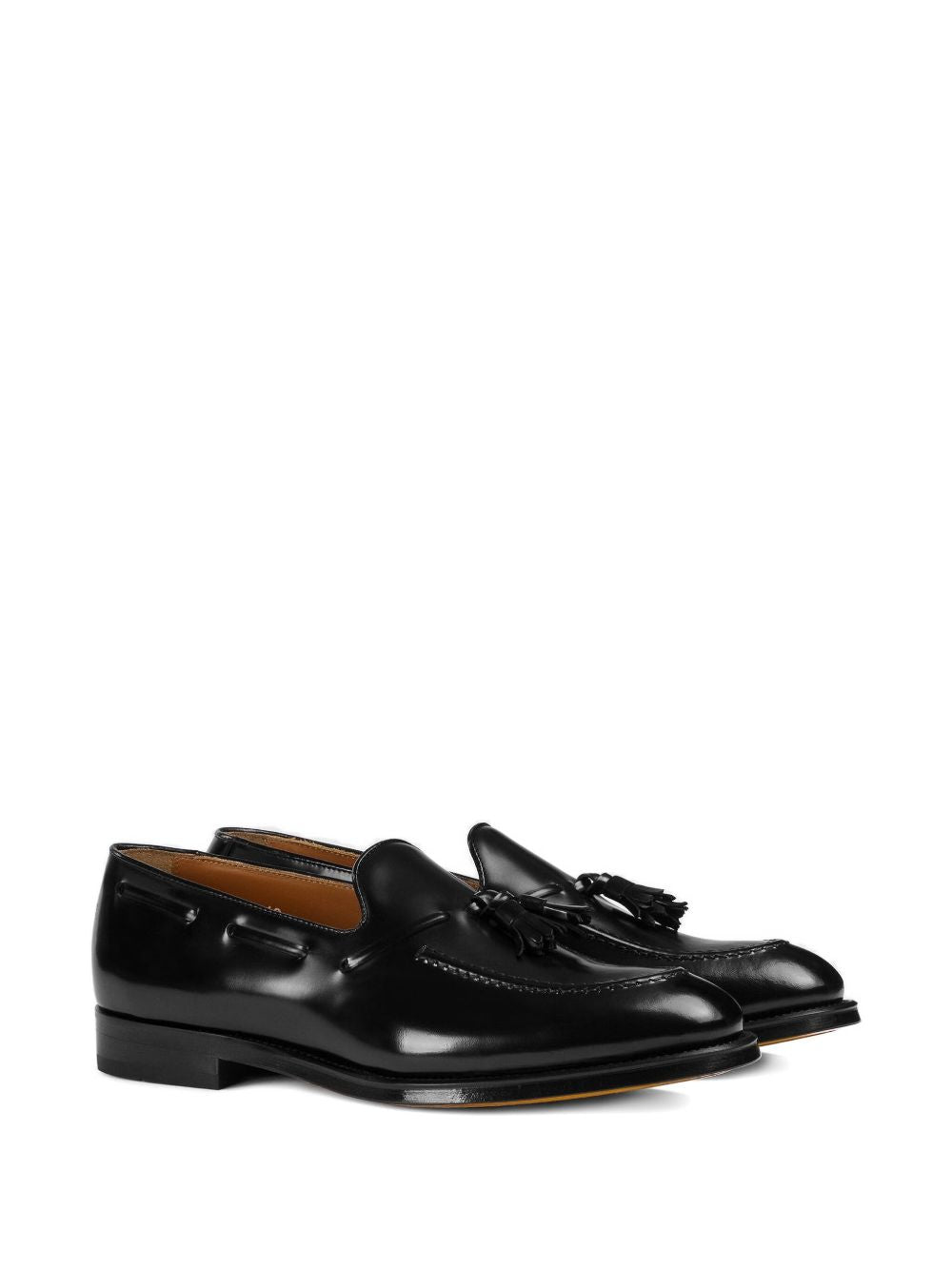 Mocassini con nappe in pelle in nero 