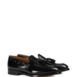 Mocassini con nappe in pelle in nero 
