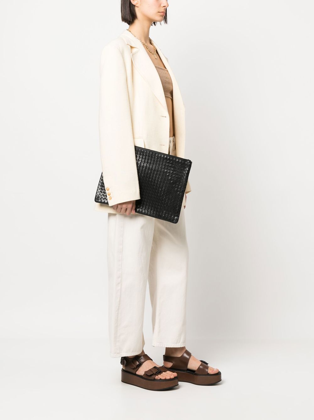 Borsa clutch intrecciata in nero 