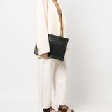 Borsa clutch intrecciata in nero 