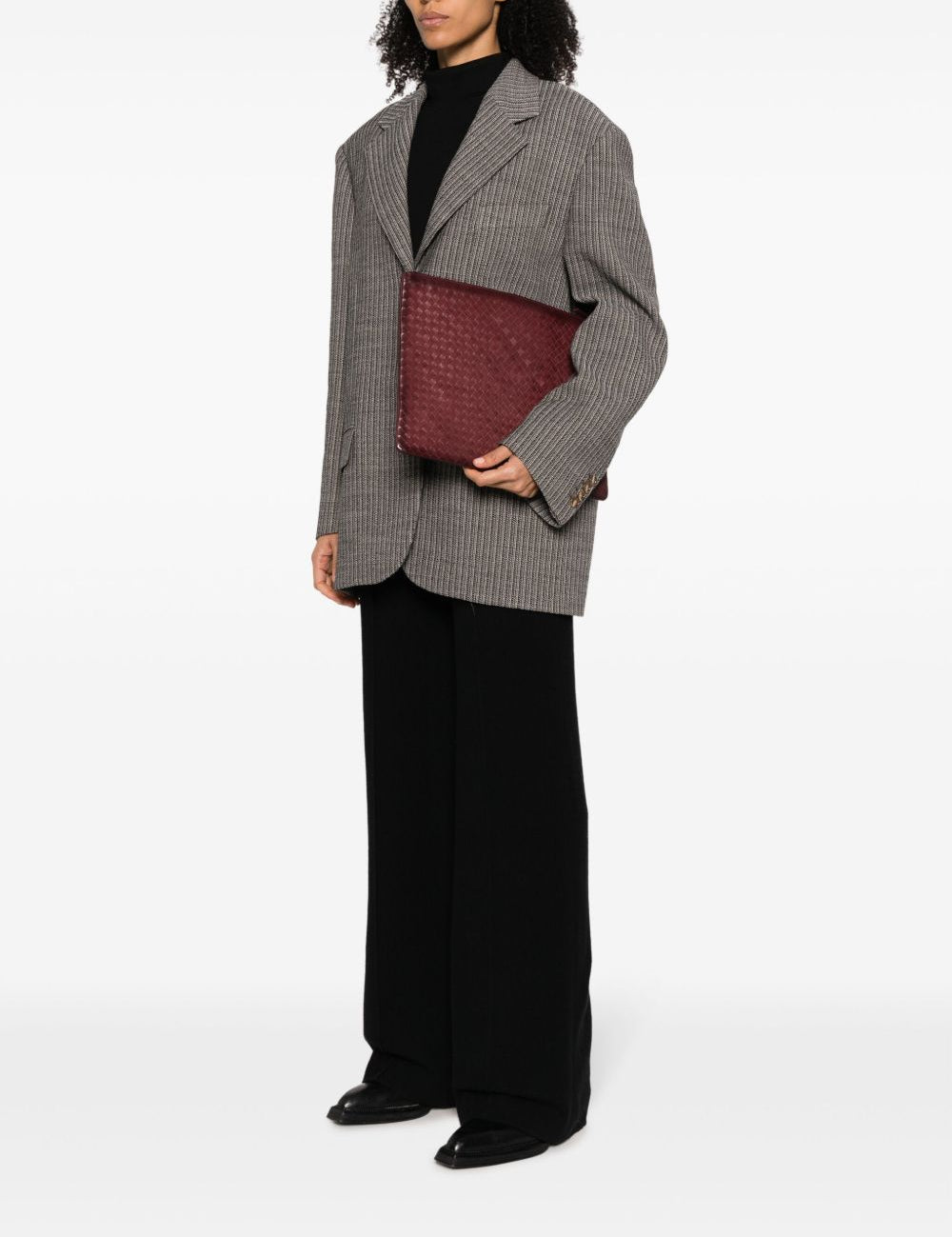 Borsa clutch intrecciata in bordeaux 