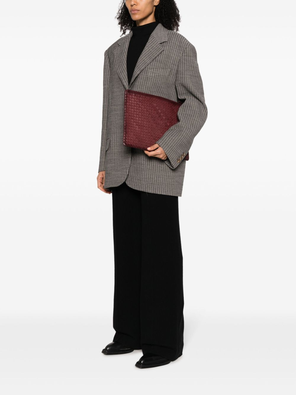 Borsa clutch intrecciata in bordeaux 