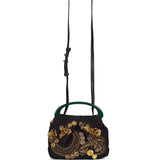 Borsa a mano con decorazioni in marrone 