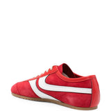 Sneakers in pelle con design a pannelli in rosso 