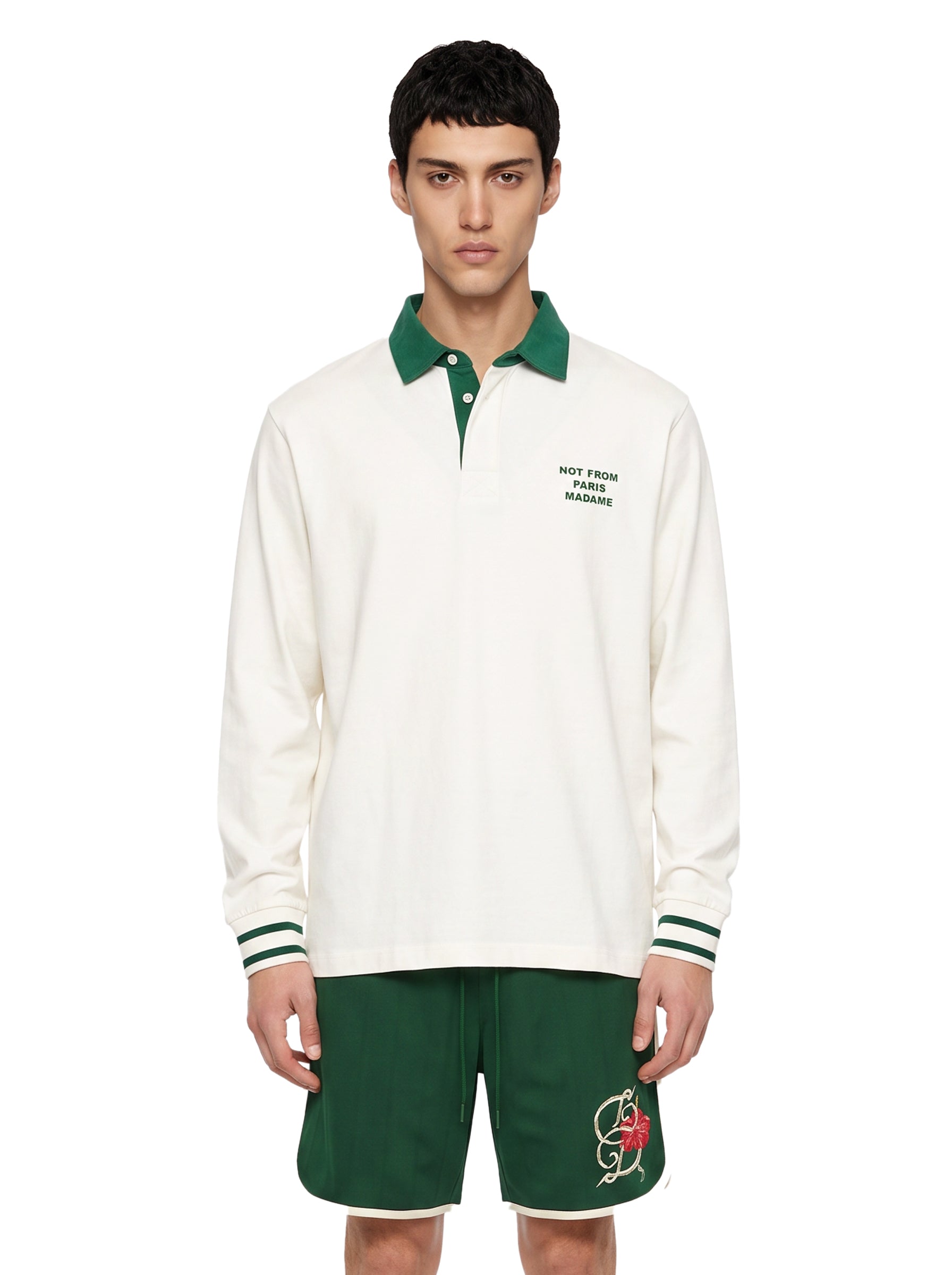 Polo con slogan Not From Paris Madame in bianco e verde 