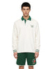 Polo con slogan Not From Paris Madame in bianco e verde