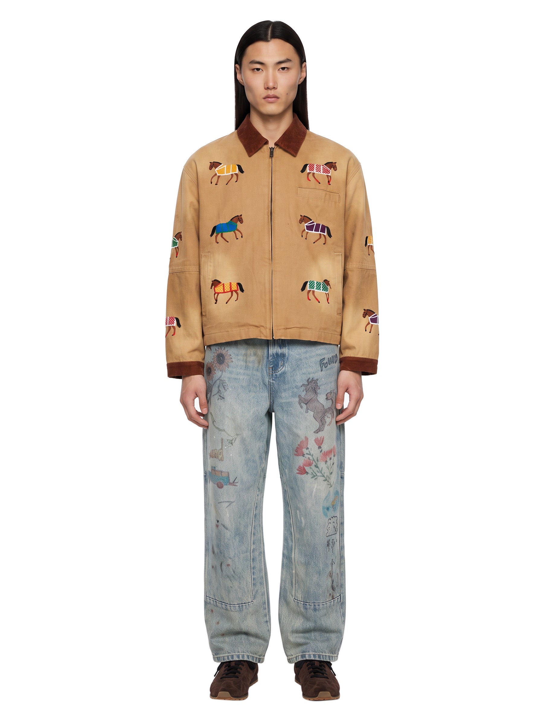 Jeans a gamba dritta con disegni hand art in celeste 
