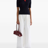 Polo con colletto a contrasto in blu e rosso 