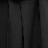 Pantaloni a vita con volant Kira in nero Khaite - donna 