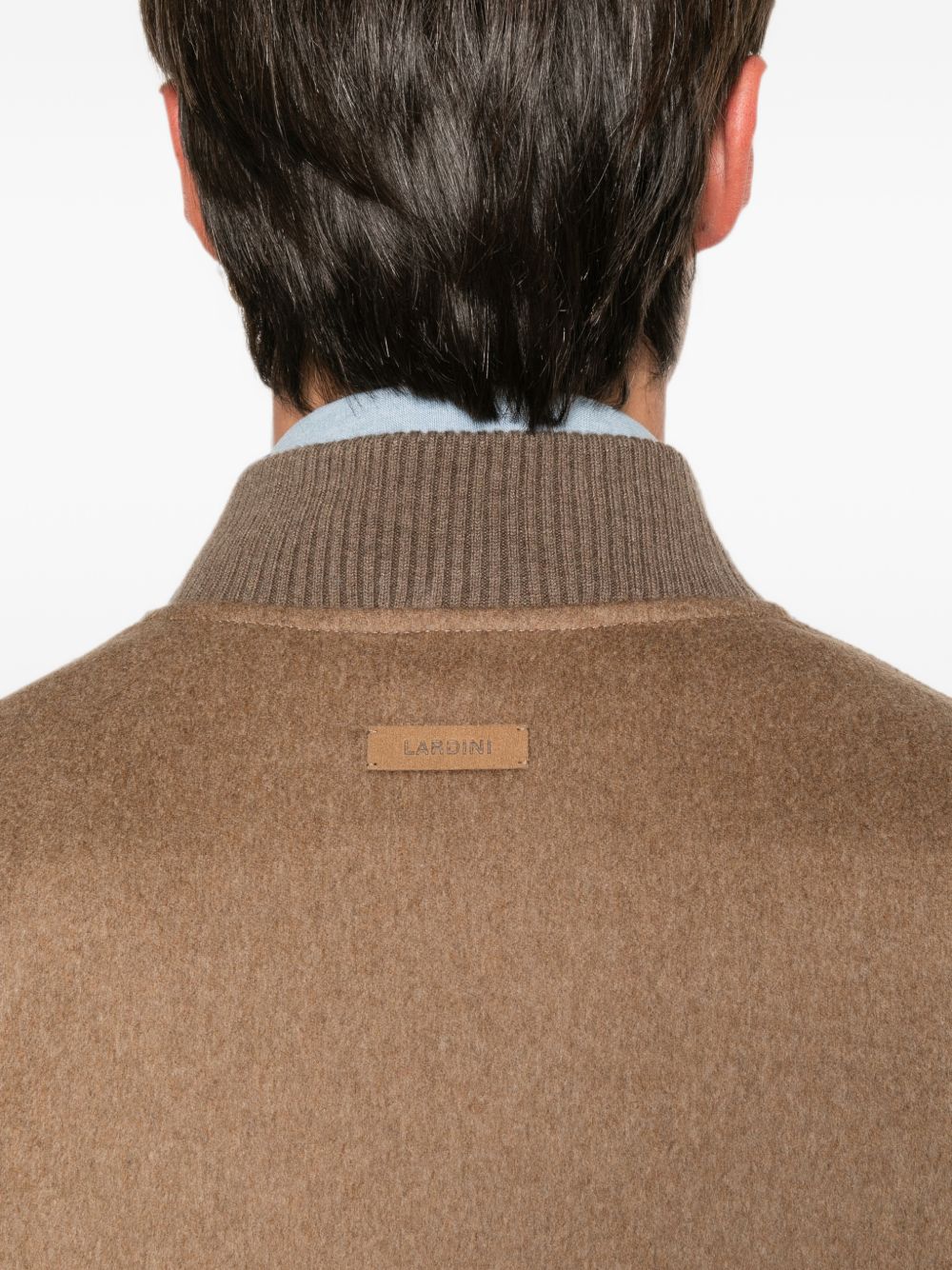 Giacca Teorema con zip in beige 