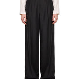 Pantaloni a pieghe in nero 
