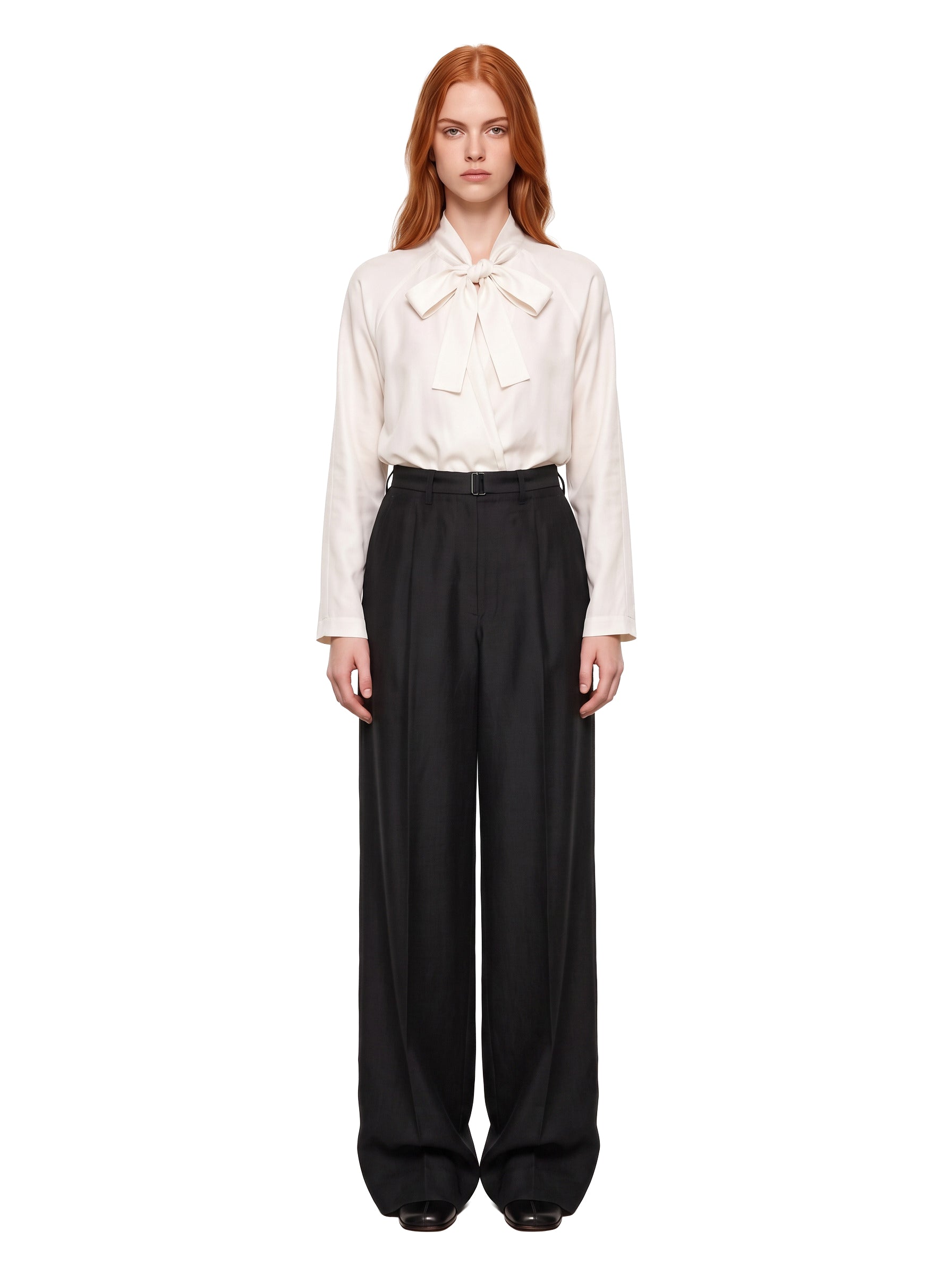Pantaloni a pieghe in nero 
